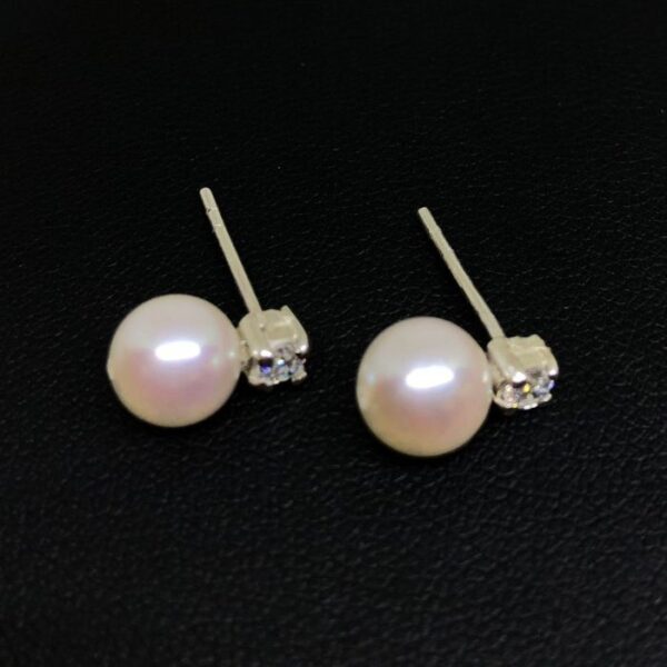 Silver Setting with Akoya pearl and CZ on Top. Pearl Size 6.5mm